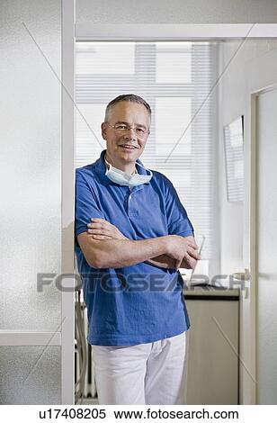 Stock Photography - Portrait of a male dentist. Fotosearch