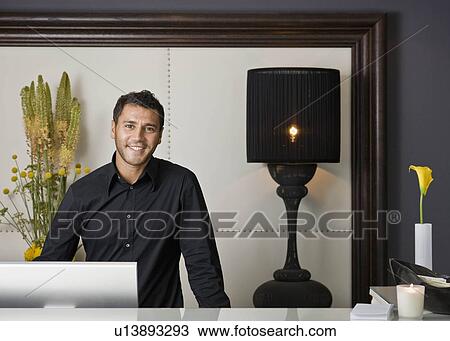 Portrait of a male receptionist View Large Photo Image Stock Image - Portrait of a male receptionist. Fotosearch