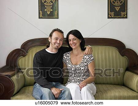 Stock Photo - Portrait of a man and woman smiling. Fotosearch