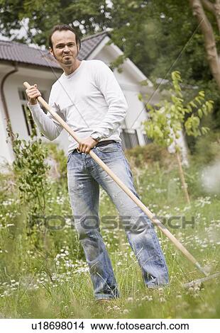 Portrait of a man gardening View Large Photo Image Picture - Portrait of a man gardening. Fotosearch