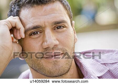 Portrait of a man smiling View Large Photo Image Picture - Portrait of a man smiling. Fotosearch