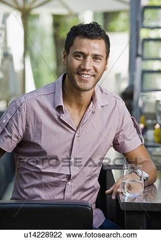 Stock Image - Portrait of a man smiling. Fotosearch