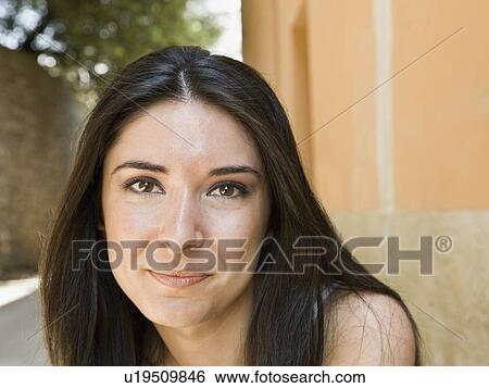 Portrait of a smiling woman View Large Photo Image Stock Photograph - Portrait of a smiling woman. Fotosearch