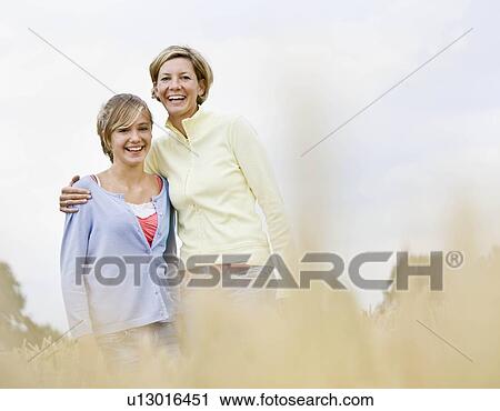 Portrait of a woman and girl View Large Photo Image Stock Image - Portrait of a woman and girl. Fotosearch