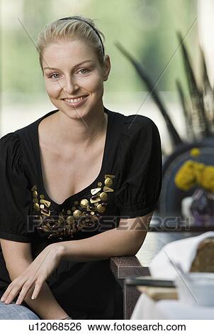 Portrait of a woman smiling View Large Photo Image Stock Photograph - Portrait of a woman smiling. Fotosearch