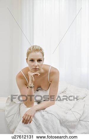 Portrait of a woman waking up View Large Photo Image Stock Image - Portrait of a woman waking up. Fotosearch