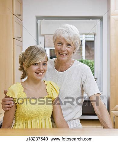 Portrait of a young girl and woman View Large Photo Image Stock Image - Portrait of a young girl and woman. Fotosearch