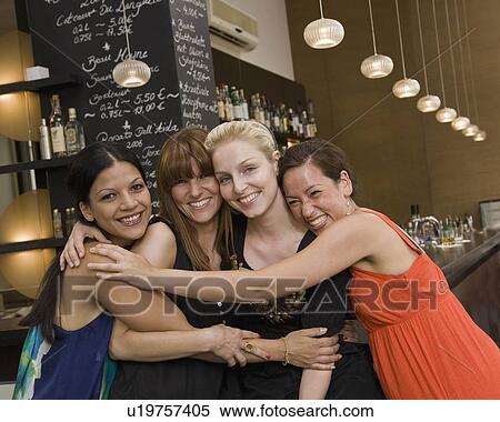 Portrait of friends at bar View Large Photo Image Stock Photography - Portrait of friends at bar. Fotosearch