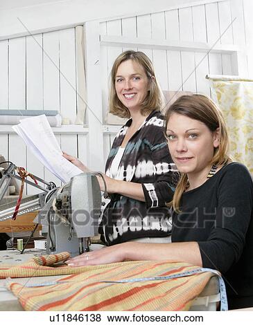 Stock Photo - Portraits 2 women at work. Fotosearch
