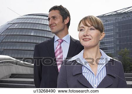 Two office workers outside View Large Photo Image Stock Image - Two office workers outside. Fotosearch