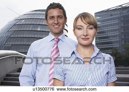 Stock Photograph - Two office workers outside. Fotosearch