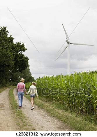 Woman and girl taking a walk View Large Photo Image Stock Image - Woman and girl taking a walk. Fotosearch