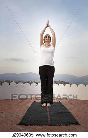 Woman doing yoga View Large Photo Image Stock Photography - Woman doing yoga. Fotosearch