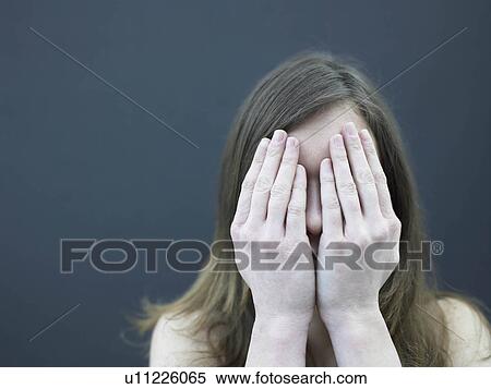woman with hands in front of face View Large Photo Image Stock Photography - woman with hands in front of face. Fotosearch