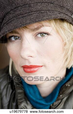 Woman with hat looking at viewer View Large Photo Image Stock Photo - Woman with hat looking at viewer. Fotosearch