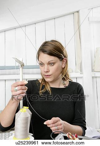 woman working at sewing machine View Large Photo Image Stock Image - woman working at sewing machine. Fotosearch