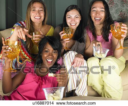 Women watching television View Large Photo Image Picture - Women watching television. Fotosearch