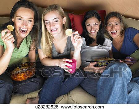 Stock Photograph - Women watching television. Fotosearch