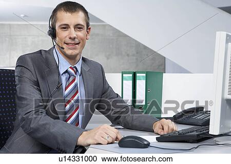 Stock Image - Young businessman. Fotosearch