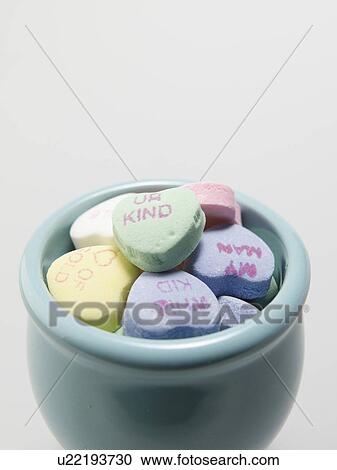 Stock Image - Bowl of Heart Shaped Candies. Fotosearch