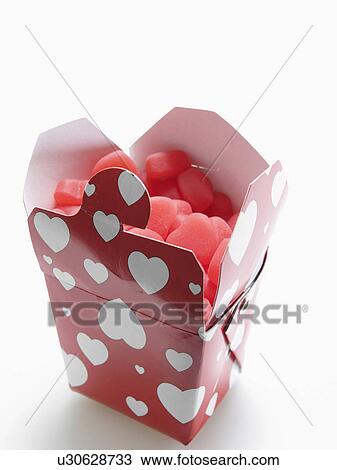 Stock Image - Box of Heart Shaped Candies. Fotosearch
