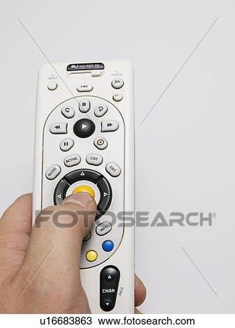 Close-Up of Person Using Remote Control View Large Photo Image Stock Image - Close-Up of Person Using Remote Control. Fotosearch