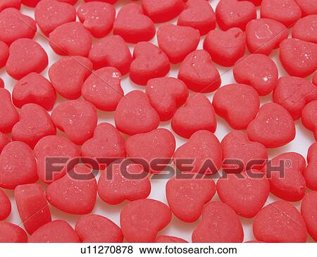 Close-Up of Red Heart Shaped Candies View Large Photo Image Stock Photo - Close-Up of Red Heart Shaped Candies. Fotosearch