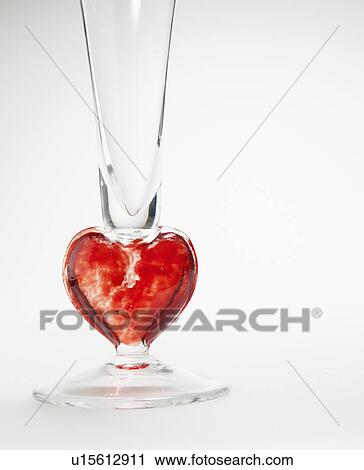 Stock Image - Decorative Glass with Heart Shape. Fotosearch