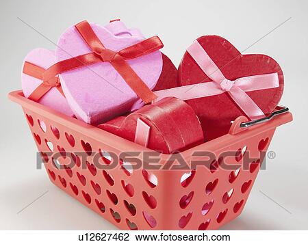 Heart Shaped Gift Boxes in Basket View Large Photo Image Stock Image - Heart Shaped Gift Boxes in Basket. Fotosearch
