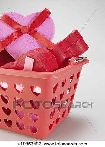 Heart Shaped Gift Boxes in Basket View Large Photo Image Stock Image - Heart Shaped Gift Boxes in Basket. Fotosearch