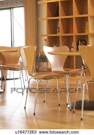 Stock Image - Tables and Chairs in Cafe. Fotosearch