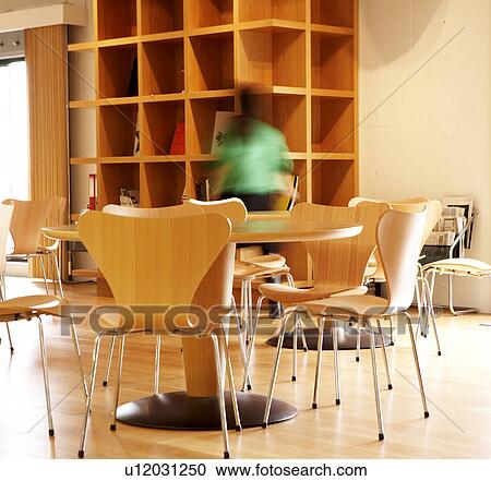 Woman By Bookshelf In Cafe Stock Image U12031250 Fotosearch