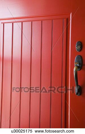 Stock Photography - bright red door and door handle. Fotosearch