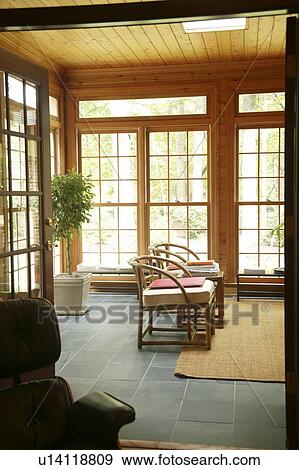 Stock Photo - Brightly lit sunroom. Fotosearch