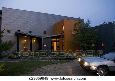 Car parked outside modern home View Large Photo Image Stock Photo - Car parked outside modern home. Fotosearch
