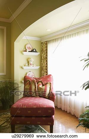 Chaise lounge near window View Large Photo Image Stock Photo - Chaise lounge near window. Fotosearch