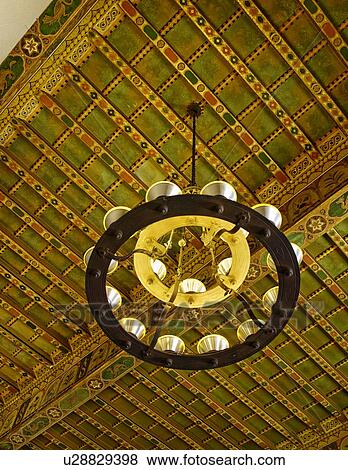 Chandelier hanging from ornate hand painted ceiling View Large Photo Image Stock Photo - Chandelier hanging from ornate hand painted ceiling. Fotosearch