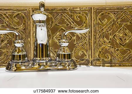Stock Photo - Chrome Bathroom faucet Close up. Fotosearch