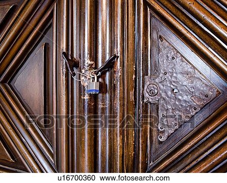 Close up contemporary lock on old wooden door View Large Photo Image Stock Image - Close up contemporary lock on old wooden door. Fotosearch
