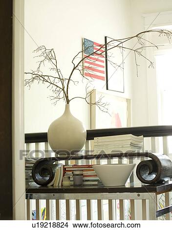 Cluttered end table in American home View Large Photo Image Picture - Cluttered end table in American home. Fotosearch