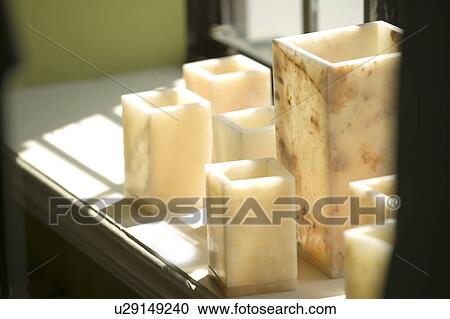 Stock Image - Collection of square candles. Fotosearch