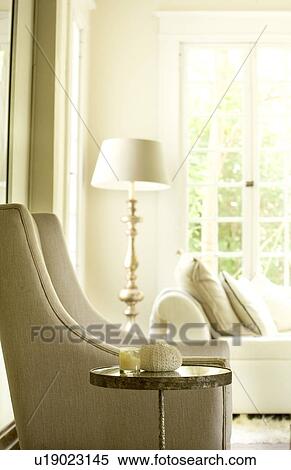 Contemporary chair in traditional living room View Large Photo Image Stock Photography - Contemporary chair in traditional living room. Fotosearch