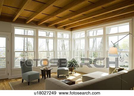 Stock Photo - Contemporary furniture in sunroom. Fotosearch