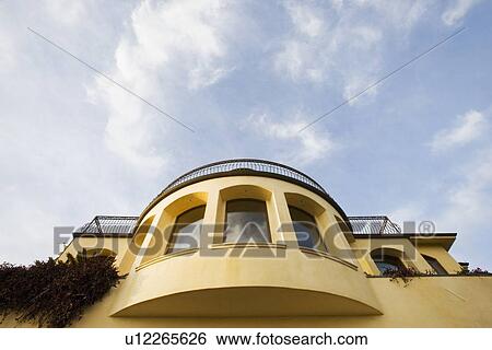 Stock Photograph - Contemporary home with curved wall. Fotosearch