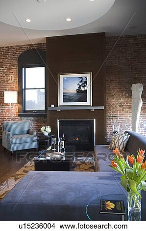 Contemporary living room with brick wall View Large Photo Image Picture - Contemporary living room with brick wall. Fotosearch