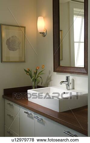 Contemporary sink and vase with tulips View Large Photo Image Stock Photo - Contemporary sink and vase with tulips. Fotosearch