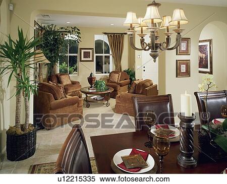 Stock Photography - Contemporary sitting room and dining room. Fotosearch