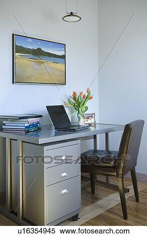 Stock Photography - Desk with laptop in home office. Fotosearch