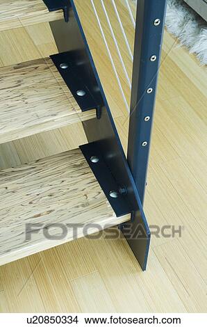Picture - Detail bottom modern wooden staircase. Fotosearch