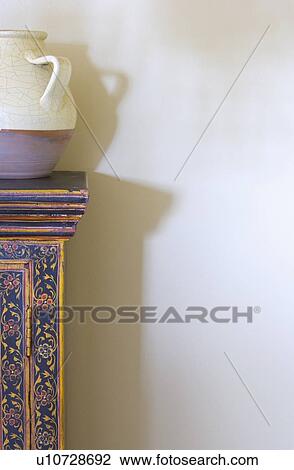 Detail ceramic vase on decorative cabinet View Large Photo Image Stock Image - Detail ceramic vase on decorative cabinet. Fotosearch